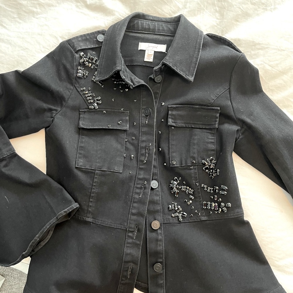 Black denim jacket with flared sleeve